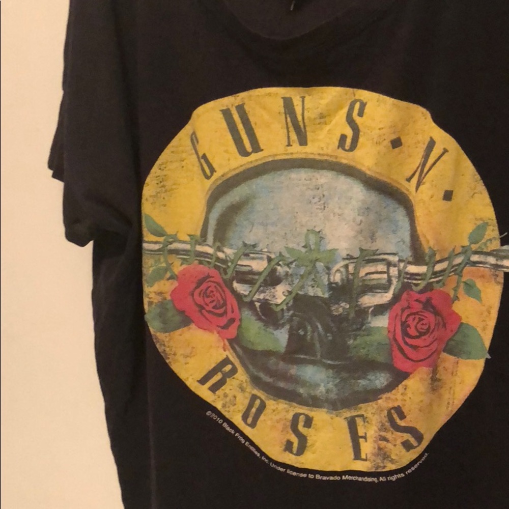 Guns N’ Roses shirt. Small hole.